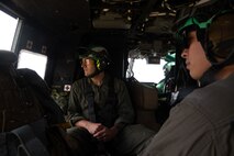 U.S. Marine Corps Sgt. Jonas Rivera, a helicopter airframe mechanic (left), and Cpl. Noah Balagtas, an aircraft avionics technician, both with Marine Light Attack Helicopter Squadron (HMLA) 773, 4th Marine Aircraft Wing, Marine Forces Reserve, assigned to Special Purpose Marine Air-Ground Task Force-250, fly on a UH-1Y Venom to Romeoville High School for a community event during Marine Week Chicago, July 10, 2025. Romeoville High School hosted a community event to celebrate the upcoming 250th anniversary of the U.S. Marine Corps. Throughout 2025, Marines across the globe will celebrate the birthday of the Corps, commemorating service, sacrifice, and priding themselves on living ‘Semper Fidelis’ or ‘Always Faithful’ to their nation and to each other. Rivera is a native of Cresco, Pennsylvania. (U.S. Marine Corps photo by Lance Cpl. Andra Marton-Salgado)