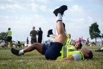U.S. Marines assigned to Special Purpose Marine Air-Ground Task Force-250 lead physical training for Chicago Police Department recruits at DuSable Harbor during Marine Week Chicago, July 10, 2025. Throughout the year Marines across the globe will celebrate the 250th birthday of the Corps, commemorating service, sacrifice, and priding themselves on living ‘Semper Fidelis’ or ‘Always Faithful’ to their nation and to each other. (U.S. Marine Corps photo by Lance Cpl. Andra Marton-Salgado)