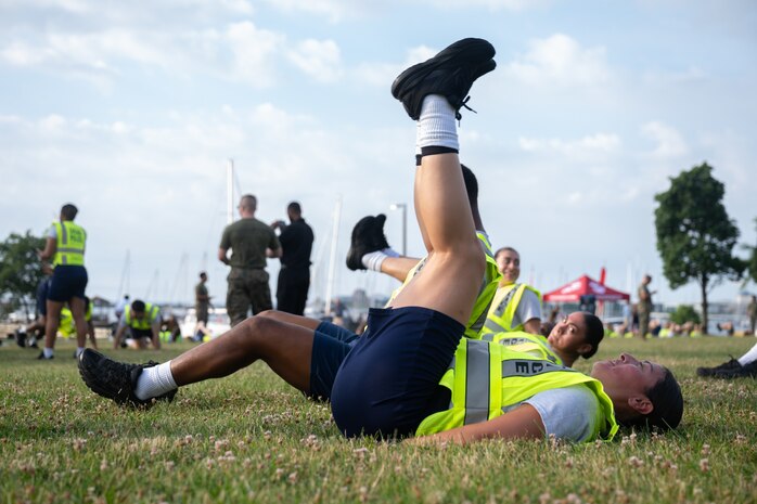 U.S. Marines assigned to Special Purpose Marine Air-Ground Task Force-250 lead physical training for Chicago Police Department recruits at DuSable Harbor during Marine Week Chicago, July 10, 2025. Throughout the year Marines across the globe will celebrate the 250th birthday of the Corps, commemorating service, sacrifice, and priding themselves on living ‘Semper Fidelis’ or ‘Always Faithful’ to their nation and to each other. (U.S. Marine Corps photo by Lance Cpl. Andra Marton-Salgado)