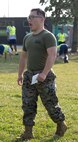 U.S. Marine Corps Lance Cpl. Poom Pasapong, an administrative specialist assigned to Special Purpose Marine Air-Ground Task Force-250, leads physical training with Chicago Police Department recruits at DuSable Harbor during Marine Week Chicago, July 10, 2025. Throughout the year, Marines across the globe will celebrate the 250th birthday of the Corps, commemorating service, sacrifice, and priding themselves on living ‘Semper Fidelis’ or ‘Always Faithful’ to their nation and to each other. (U.S. Marine Corps photo by Lance Cpl. Andra Marton-Salgado)