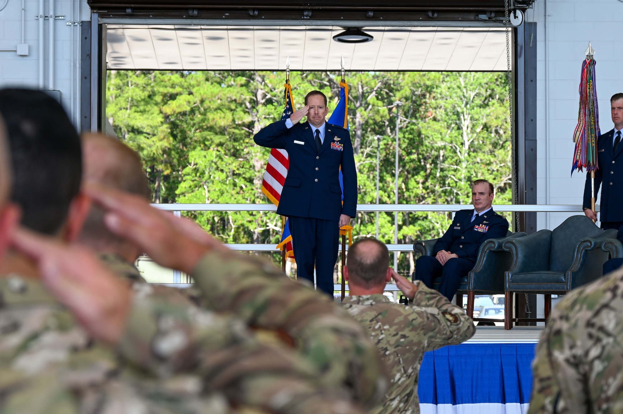 Members of the 711th Special Operations Squadron render a salute to U.S. Air Force Lt. Col. Jason Fox, incoming 711th Special Operations Squadron commander, at a change of command ceremony at Hurlburt Field, Florida, July 11, 2025. A longstanding military tradition, the ceremony marked the official transfer of command of the 711th SOS. (U.S. Air Force photo by Liz Easterling)