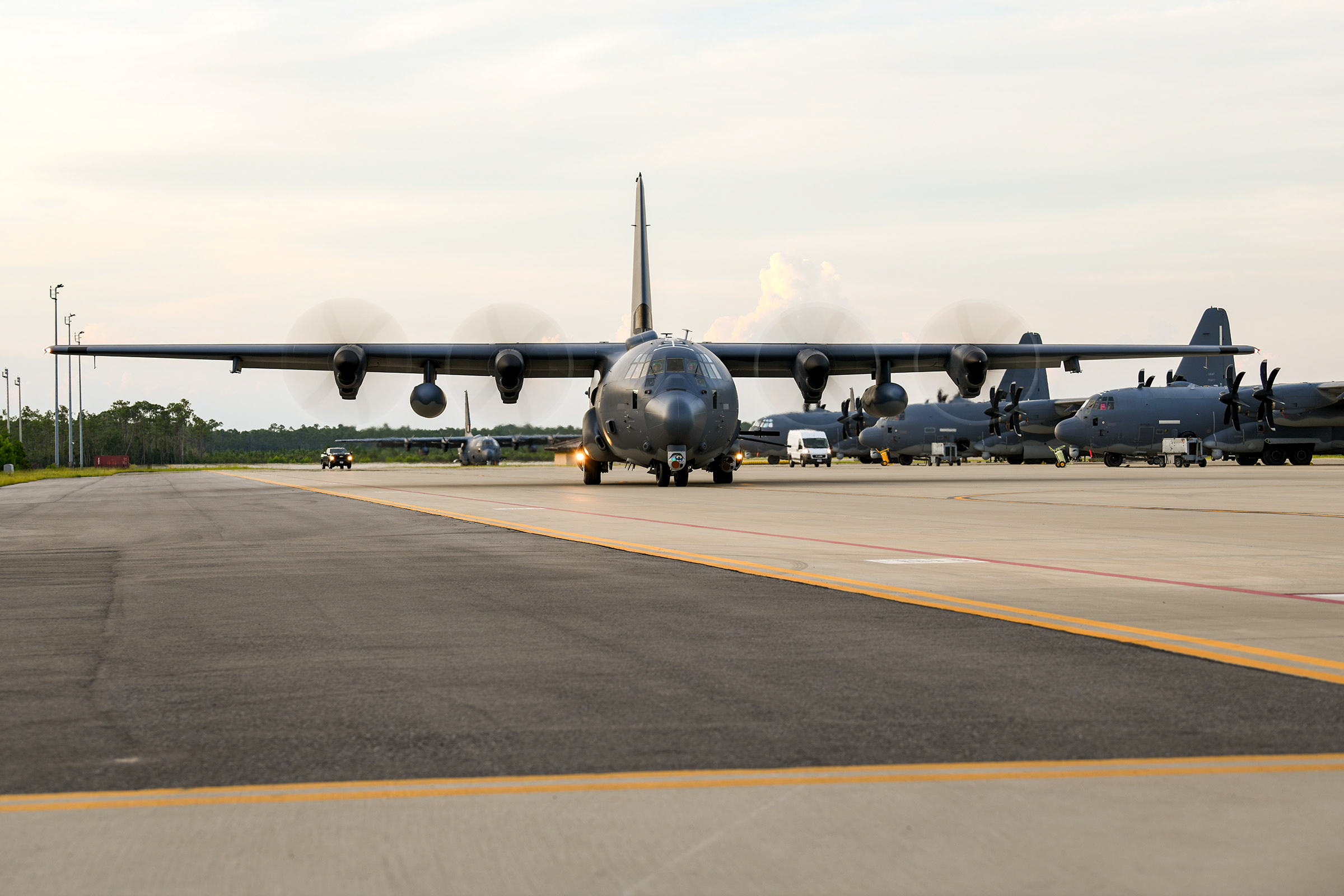 An AC-130J aircrew assigned to the  919h Special Operations Wing taxis an AC-130J Ghostrider gunship at Hurlburt Field, Florida, July 9, 2025. The wing’s mission is evolving and now includes an operational AC-130J squadron based at Hurlburt Field marked by a ceremony held July 11, 2025. The AC-130J provides ground forces an expeditionary, direct-fire platform that is persistent, ideally suited for urban operations and delivers precision low-yield munitions against ground targets. (U.S. Air Force photo by Lt. Col. James Wilson)
