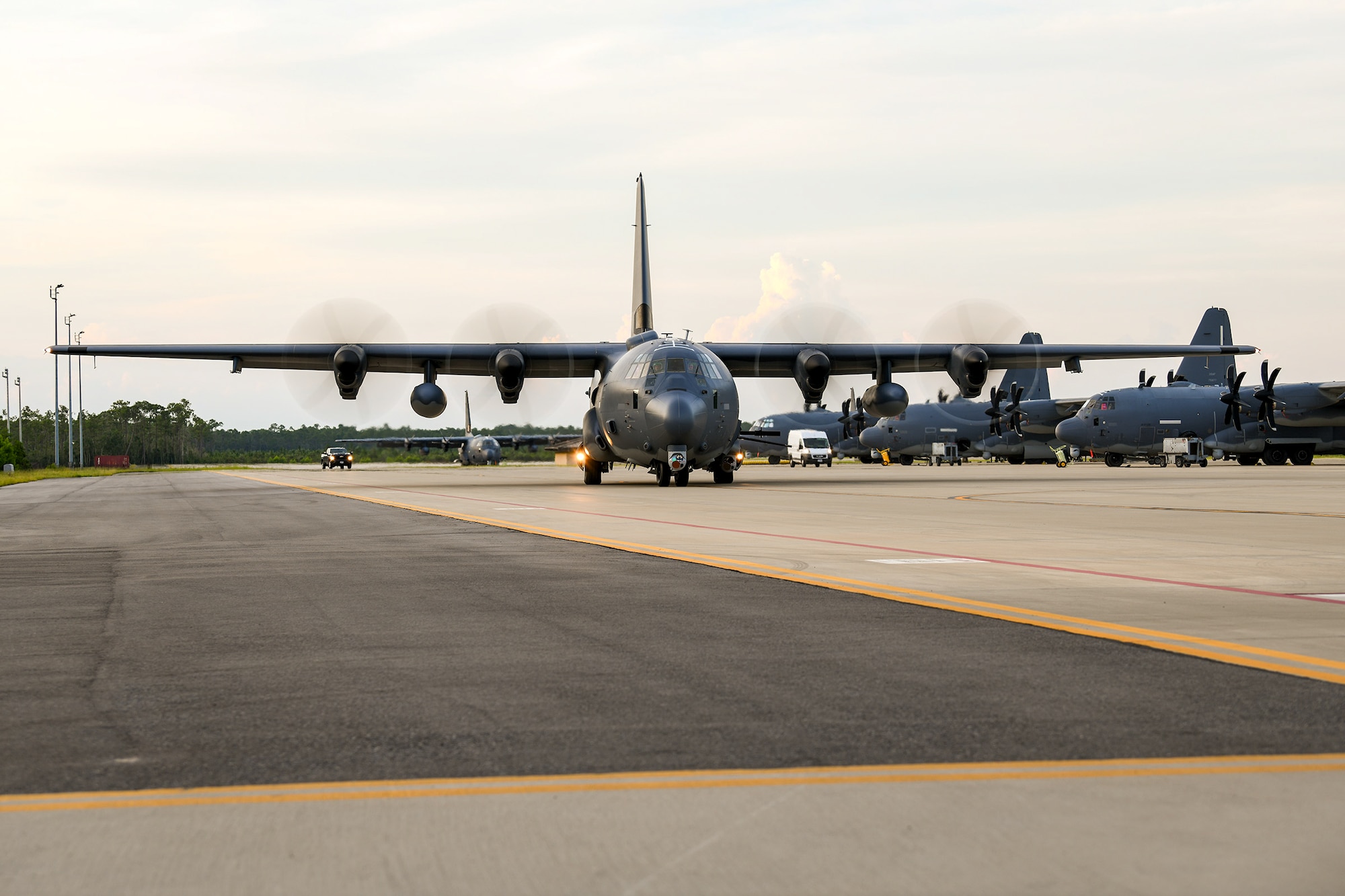 An AC-130J aircrew assigned to the  919h Special Operations Wing taxis an AC-130J Ghostrider gunship at Hurlburt Field, Florida, July 9, 2025. The wing’s mission is evolving and now includes an operational AC-130J squadron based at Hurlburt Field marked by a ceremony held July 11, 2025. The AC-130J provides ground forces an expeditionary, direct-fire platform that is persistent, ideally suited for urban operations and delivers precision low-yield munitions against ground targets. (U.S. Air Force photo by Lt. Col. James Wilson)