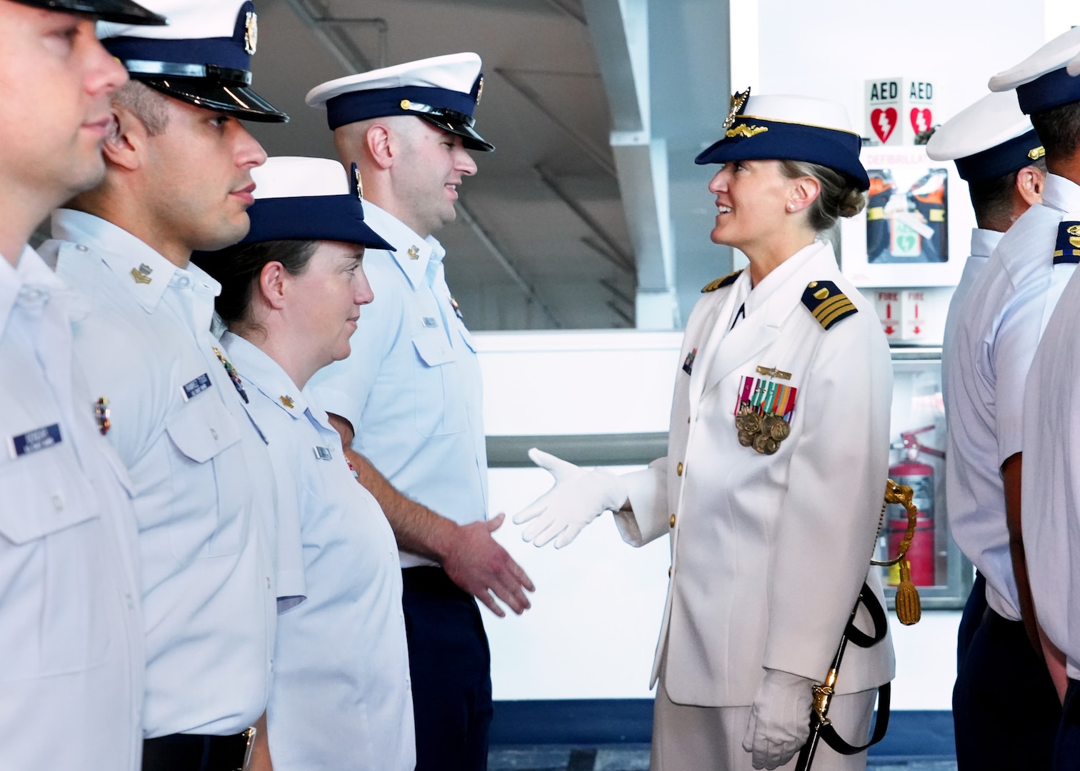 Cmdr. Matthew Zinn assumes command of Coast Guard Marine Safety Unit Port Canaveral from Cmdr. Sarah Brennan during a change of command ceremony in Port Canaveral, Florida, July 11, 2025.