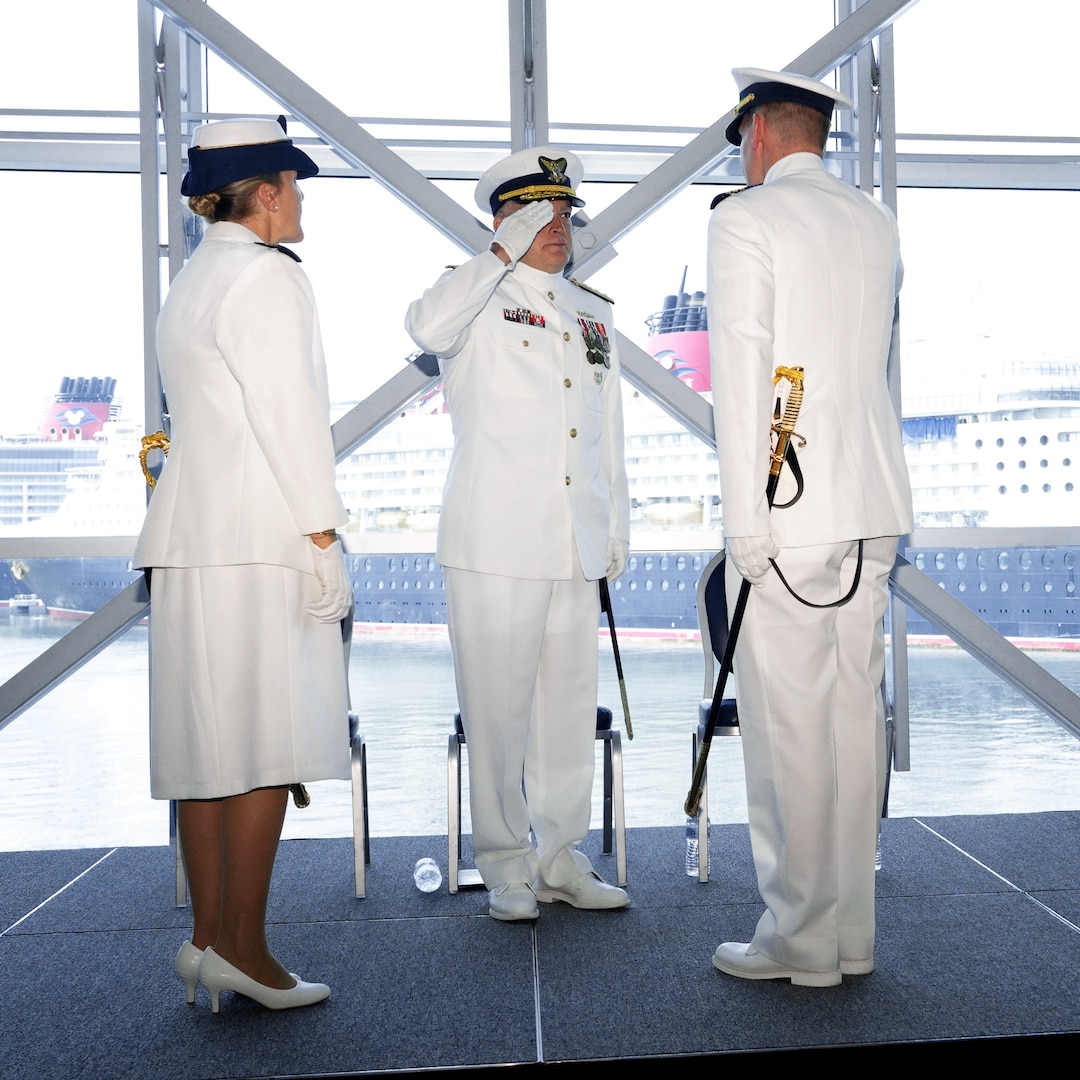 Cmdr. Matthew Zinn assumes command of Coast Guard Marine Safety Unit Port Canaveral from Cmdr. Sarah Brennan during a change of command ceremony in Port Canaveral, Florida, July 11, 2025.