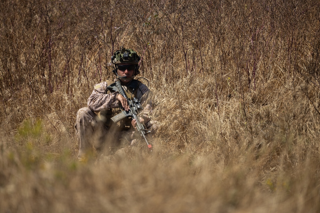 U.S. Marine Corps Sgt. Devin Lebeau, a squad leader with 3rd Battalion, 1st Marine Regiment, 1st Marine Division, posts security during a boat raid course hosted by Expeditionary Operations Training Group, I Marine Expeditionary Force, at Marine Corps Base Camp Pendleton, California, June 25, 2025.