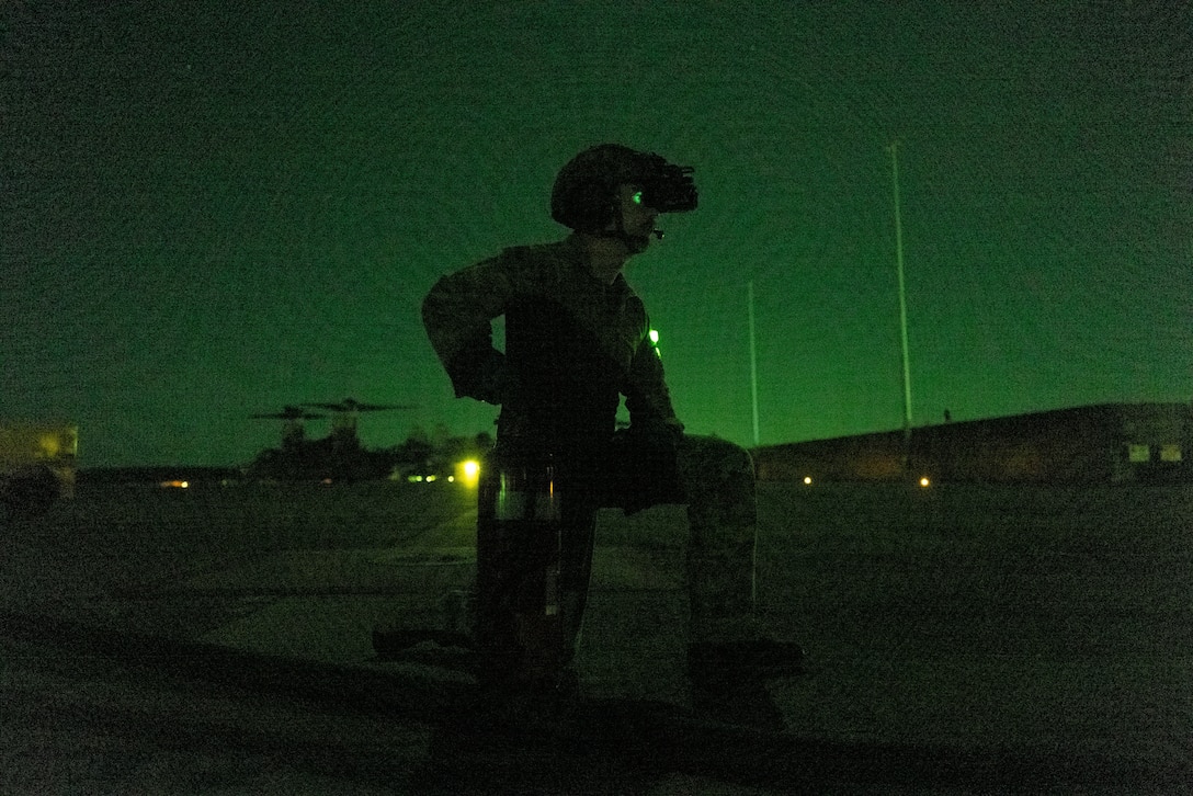 An Australian Defence Force soldier from the 1st Aviation Regiment observes a tactical aviation ground refueling system (TAGRS) demonstration on Royal Australian Air Force Base Darwin, Australia, July 08, 2025. This is the first time the TAGRS has been used to refuel an Australian aircraft, marking a new milestone in bilateral expeditionary refueling operations. MRF-D 25.3 is part of an annual six-month rotational deployment to enhance interoperability with the Australian Defence Force and Allies and partners and provide a forward-postured crisis response force in the Indo-Pacific. (U.S. Marine Corps photo by Sgt. Brian A. Stippey)