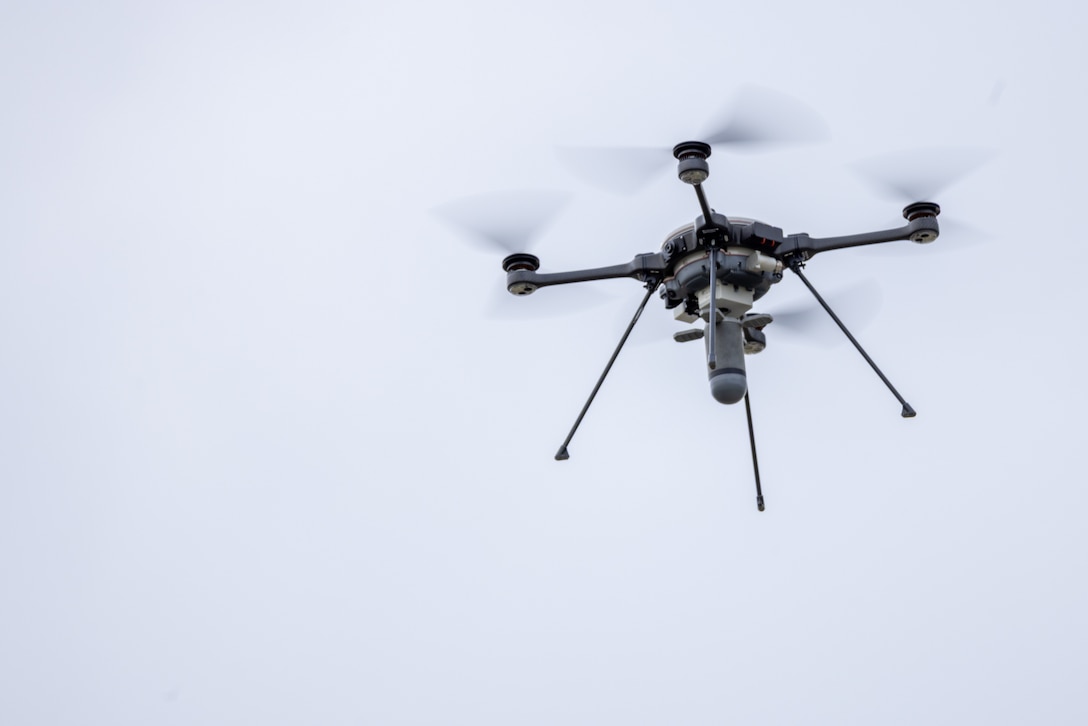 An R80D SkyRaider small unmanned aircraft system (SUAS) carries a Mjolnir munitions system during a combined arms live-fire training exercise involving the employment of SUAS to deliver munitions on designated targets at Camp Lejeune, North Carolina, July 3, 2025. This event marked the first time munitions were employed from SUAS during a live-fire training exercise on Camp Lejeune, demonstrating the capability of integrating aerial strike capabilities at the tactical level.