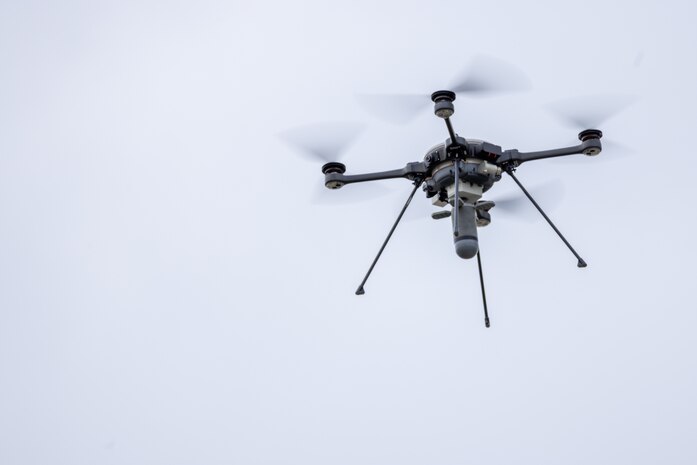 An R80D SkyRaider small unmanned aircraft system (SUAS) carries a Mjolnir munitions system during a combined arms live-fire training exercise involving the employment of SUAS to deliver munitions on designated targets at Camp Lejeune, North Carolina, July 3, 2025. This event marked the first time munitions were employed from SUAS during a live-fire training exercise on Camp Lejeune, demonstrating the capability of integrating aerial strike capabilities at the tactical level.