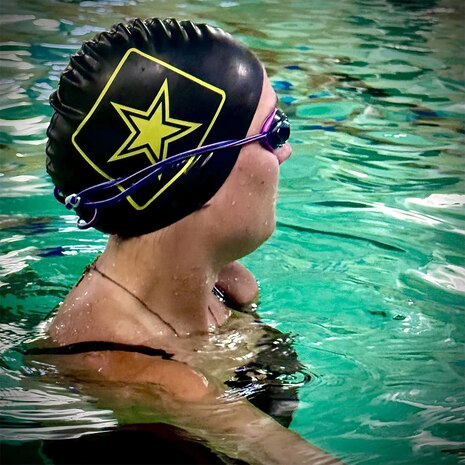 Ret. Spc. Avery practicing swimming for the Warrior Games.