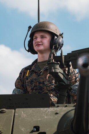 A member with the Marine Corps Junior Reserve Officers’ Training Corps poses for a picture at Romeoville High School during Marine Week Chicago, Illinois, July 10, 2025. During Marine Week Chicago, Marines with Marine Corps Recruiting Command shared Marine Corps traditions with local high schools in honor of the Corps’ 250th birthday. The Marine Corps is celebrating its 250th birthday with six multi-day Marine Corps community events, called Marine Weeks, in six major cities across the country. Marine Weeks will include activations across each host city featuring aircraft, equipment, recruiting opportunities, and public engagements. (U.S. Marine Corps photo by Cpl. Sarah Grawcock)