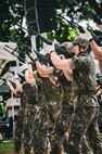 Republic of Korea soldiers stand with their weapons as they prepare to fire during the 75th anniversary Commemoration of the Battle of Cheonan, Cheonan City, South Korea, July 8, 2025.
