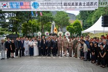 U.S. Army and Republic of Korea Soldiers, along with city officials and community members, pose for a group photo to conclude the 75th anniversary Commemoration of the Battle of Cheonan, Cheonan City, South Korea, July 8, 2025.