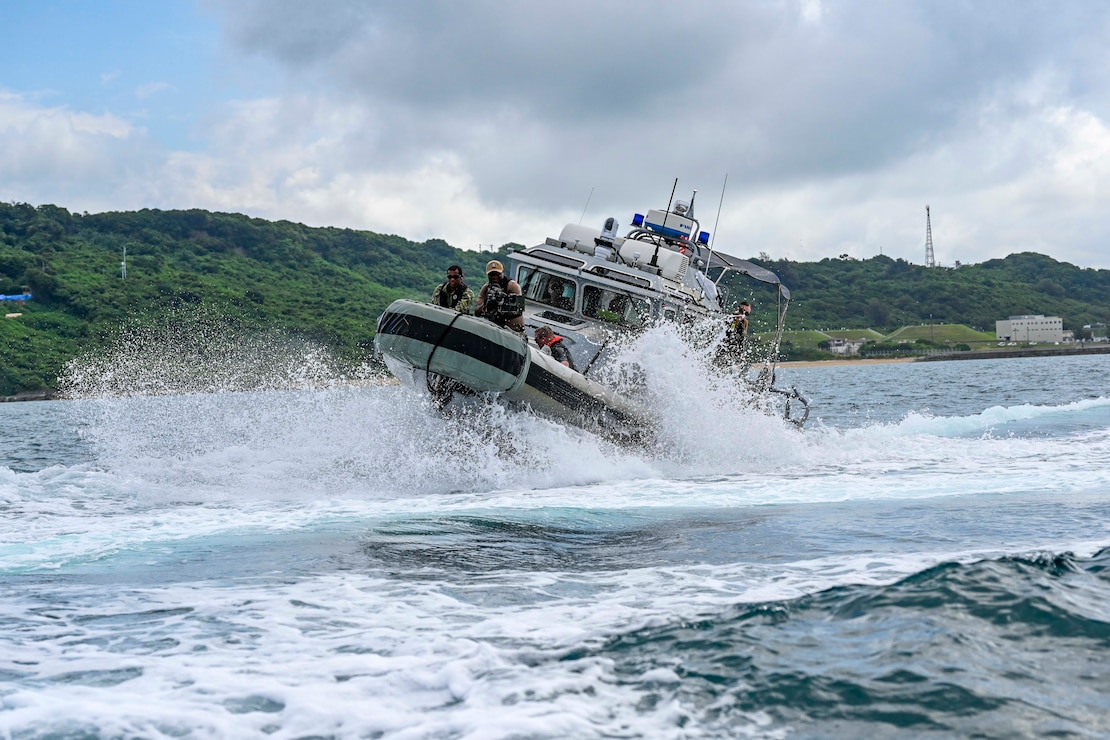A 33-foot Force Protection-Medium Harbor Security Boat attached to Commander, Fleet Activities Okinawa’s (CFAO) Naval Security Forces (NSF) conducts high-speed maneuvers during a Citadel Protect weapons training exercise in the waters near White Beach Naval Facility, Japan, July 9, 2025.