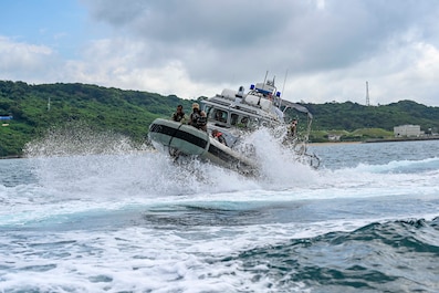 WHITE BEACH NAVAL FACILITY, Japan (July 9, 2025) — A 33-foot Force Protection-Medium Harbor Security Boat attached to Commander, Fleet Activities Okinawa’s (CFAO) Naval Security Forces (NSF) conducts high-speed maneuvers during a Citadel Protect...