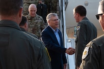 U.S. Air Force Col. Joshua Wiitala, 509th Bomb Wing commander, right, greets Secretary of the Air Force Troy Meink at Whiteman Air Force Base, Missouri, July 10, 2025.