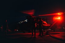 U.S. Marines with Marine Rotational Force – Darwin 25.3 and Australian soldiers from the 1st Aviation Regiment refuel an Australian ARH Tiger helicopter using a tactical aviation ground refueling system (TAGRS) at Royal Australian Air Force Base Darwin, Australia, July 08, 2025.