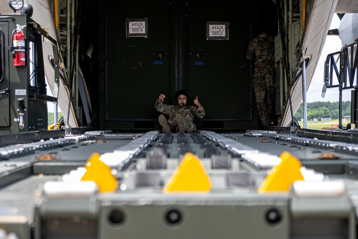 U.S. Air Force Staff Sgt. Adam Tristram, 36th Airlift Squadron air transportation cargo unloader, aligns a K-loader truck with a U.S. Air Force C-130J Super Hercules for cargo offloading in support of exercise Resolute Force Pacific (REFORPAC) 2025 at Misawa Air Base, Japan, July 10, 2025.