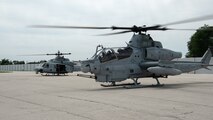 U.S. Marines with Marine Light Attack Helicopter Squadron (HMLA) 773, 4th Marine Aircraft Wing, assigned to Special Marine Air-Ground Task Force-250 prepare an AH-1Z Viper to take off as part of an outreach and engagement flight during Marine Week Chicago, July 11, 2025. This year, the Marine Corps will celebrate two and a half centuries of serving the Nation with honor, courage, and commitment. (U.S. Marine Corps photo by Cpl. Diana Salgado)