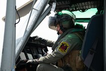 U.S. Marine Corps Maj. Daphne Kelly, a pilot with Marine Light Attack Helicopter Squadron (HMLA) 773, 4th Marine Aircraft Wing, assigned to Special Marine Air-Ground Task Force-250 carries out pre-flight checks on a UH-1Y Venom helicopter during an outreach and engagement flight during Marine Week Chicago, July 11, 2025. This year, the Marine Corps will celebrate two and a half centuries of serving the Nation with honor, courage, and commitment. (U.S. Marine Corps photo by Cpl. Diana Salgado)