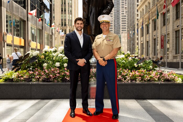 John Gagliardo, the founder of The One Companies, left, and U.S Marine Corps Col. J.J. Wilson, the commanding officer of Special Purpose Marine Air-Ground Task Force-250, pose for a photo during Marine Week Chicago, July 10, 2025. The opening ceremony signifies the start of Marine Week Chicago and represents the ethos of U.S. Marines to Chicago residents. Throughout 2025, Marines across the globe will celebrate the 250th birthday of the Corps, commemorating service, sacrifice, and priding themselves on living ‘Semper Fidelis’ or ‘Always Faithful’ to their nation and to each other. (U.S. Marine Corps photo by Lance Cpl. Elijua Guel)