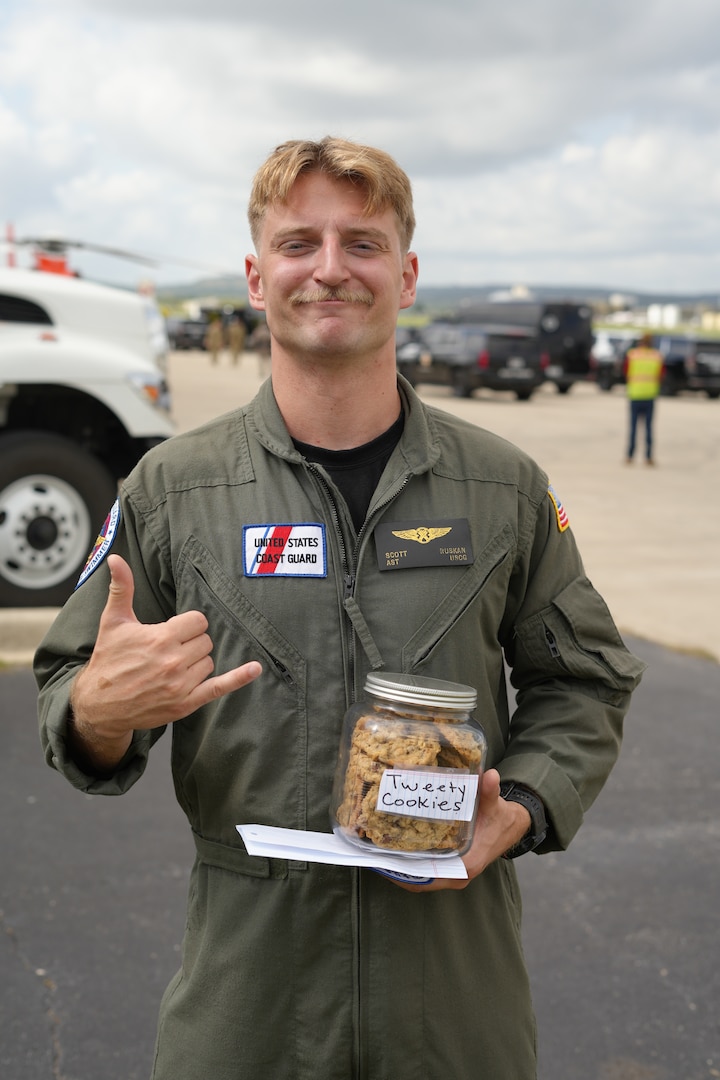 AST 3rd Class Scott Ruskan received a care package of Camp Mystic’s “Tweety Cookies” on July 11, 2025—sent by a camper in recognition of his rescue efforts on July 4. These oatmeal‑chocolate chip cookies, created by camp co-owner Tweety Eastland, served as traditional tokens of encouragement and comfort among campers.