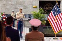 U.S. Marine Corps Lt. Col. Dan Lakhani, the inspector instructor for 2nd Battalion, 24th Marine Regiment, assigned to Special Purpose Marine Air-Ground Task Force-250, delivers a speech at a wreath laying ceremony at the Vietnam Veterans Memorial during Marine Week Chicago, July 11, 2025. The wreath laying ceremony was held to honor U.S. Marine Corps Sgt. Thomas Gilbert and other Marines who paid the ultimate sacrifice during Operation Iraqi Freedom. This year, the Marine Corps will celebrate two and a half centuries of serving the nation with honor, courage, and commitment. (U.S. Marine Corps photo by Lance Cpl. Elijua Guel)