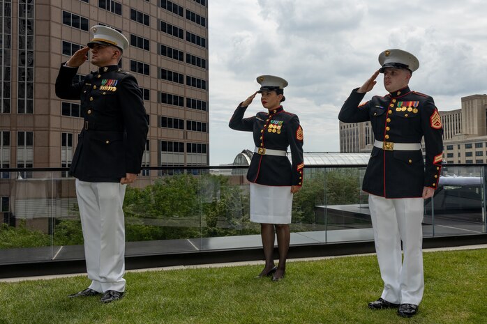 U.S. Marines assigned to Special Purpose Marine Air-Ground Task Force-250 salute during a ceremony for Jamaria Peters at the Willis Tower during Marine Week Chicago, July 11, 2025. The event featured a performance from the Marine Corps Silent Drill Platoon, music from the Quantico Marine Band, and the appearance of drill instructors from Marine Corps Recruit Depot San Diego. This year, the Marine Corps will celebrate two and a half centuries of serving the nation with honor, courage, and commitment. (U.S. Marine Corps photo by Lance Cpl. Elijua Guel)