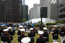 U.S. Marines assigned to Special Purpose Marine Air-Ground Task Force-250, Make-A-Wish Foundation staff, and others attend a ceremony for Jamaria Peters at the Willis Tower during Marine Week Chicago, July 11, 2025. Peters, a recipient of the foundation, was able to observe performances from the Marine Corps Silent Drill Platoon, music from the Quantico Marine Band, and saw an appearance from drill instructors who had traveled from Marine Corps Recruit Depot San Diego. This year, the Marine Corps will celebrate two and a half centuries of serving the nation with honor, courage, and commitment. (U.S. Marine Corps photo by Lance Cpl. Elijua Guel)