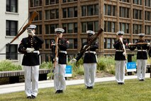 The U.S. Marine Corps Silent Drill Platoon, assigned to Special Purpose Marine Air-Ground Task Force-250, perform during a ceremony for Jamaria Peters at the Willis Tower during Marine Week Chicago, July 11, 2025. The event featured a performance from the drill team, music from the Quantico Marine Band, and the appearance of drill instructors from Marine Corps Recruit Depot San Diego. This year, the Marine Corps will celebrate two and a half centuries of serving the nation with honor, courage, and commitment. (U.S. Marine Corps photo by Lance Cpl. Elijua Guel)