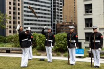 The U.S. Marine Corps Silent Drill Platoon, assigned to Special Purpose Marine Air-Ground Task Force-250, perform during a ceremony for Jamaria Peters at the Willis Tower during Marine Week Chicago, July 11, 2025. The event featured a performance from the drill team, music from the Quantico Marine Band, and the appearance of drill instructors from Marine Corps Recruit Depot San Diego. This year, the Marine Corps will celebrate two and a half centuries of serving the nation with honor, courage, and commitment. (U.S. Marine Corps photo by Lance Cpl. Elijua Guel)