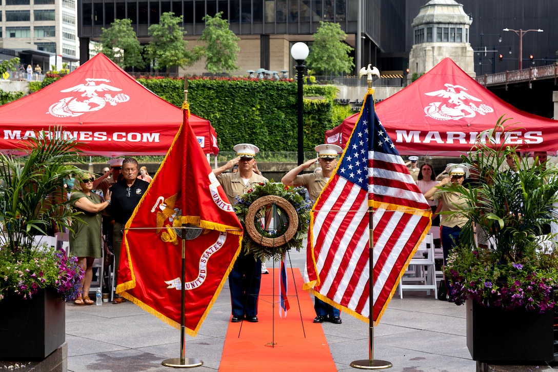 U.S. Marines assigned to Special Purpose Marine Air-Ground Task Force-250 salute during “Taps,” a song commonly played during memorial services, at a wreath laying ceremony at the Vietnam Veterans Memorial during Marine Week Chicago, July 11, 2025. The wreath laying ceremony was held to honor U.S. Marine Corps Sgt. Thomas Gilbert and other Marines who paid the ultimate sacrifice during Operation Iraqi Freedom. This year, the Marine Corps will celebrate two and a half centuries of serving the nation with honor, courage, and commitment. (U.S. Marine Corps photo by Lance Cpl. Elijua Guel)