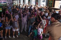Nashville attendees watch the 2nd Marine Aircraft Wing band, Special-Purpose Marine Air-Ground Task Force 250, perform at the Honky Tonk Central as part of Marine Week Nashville, in Nashville, Tennessee, June 8, 2025. The Honky Tonk Central hosted 2d Marine Aircraft Wing band as a way to show support for the Marine Corps. Throughout 2025, Marines across the globe will celebrate the 250th birthday of the Corps, commemorating service, sacrifice, and priding themselves on living 'Semper Fidelis' or 'Always Faithful' to their nation and to each other. (U.S. Marine Corps photo by Lance Cpl. Judith Ann Lazaro)