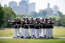 U.S. Marines with the Silent Drill Platoon, Marine Barracks Washington, perform during a wreath laying ceremony at Bicentennial Park in Nashville, Tennessee, June 4, 2025. Marines came out to the park to engage with the community, and to pay homage to Marines past and present. Throughout 2025, Marines across the globe will celebrate the 250th birthday of the Corps, commemorating, service, sacrifice, and priding themselves on living ‘Semper Fidelis’ or ‘Always Faithful’ to their nation and to each other. (U.S. Marine Corps photo by Cpl. Vincent Needham)