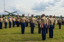 U.S. Marines with 2d Marine Aircraft Wing Band recites the Oath of Enlistment for a reenlistment ceremony during the Cracker Barrel 400 brand activation as part of Marine Week Nashville 2025 at the Nashville Superspeedway, Nashville, Tennessee, June 1, 2025. Founded on November 10, 1775, the United States Marine Corps has served our nation honorably in every clime and place for 250 years. Throughout 2025, Marines across the globe will celebrate the 250th birthday of the Corps, commemorating service, sacrifice, and priding themselves on living 'Semper Fidelis' or 'Always Faithful' to their nation and to each other. (U.S. Marine Corps photo by Lance Cpl. Judith Ann Lazaro)