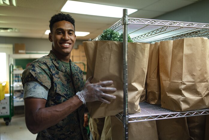 U.S. Marine Corps Lance Cpl. Dylan Belisle, a motor transport operator with 2d Combat Engineer Battalion, 2d Marine Division, poses for a photo during a volunteer event at The Branch of Nashville as part of Marine Week Nashville, in Nashville, Tennessee, June 2, 2025. Founded on November 10, 1775, the United States Marine Corps has served our nation honorably in every clime and place for 250 years. Throughout 2025, Marines across the globe will celebrate the 250th birthday of the Corps, commemorating service, sacrifice, and priding themselves on living 'Semper Fidelis' or 'Always Faithful' to their nation and to each other. (U.S. Marine Corps photo by Lance Cpl. Judith Ann Lazaro)