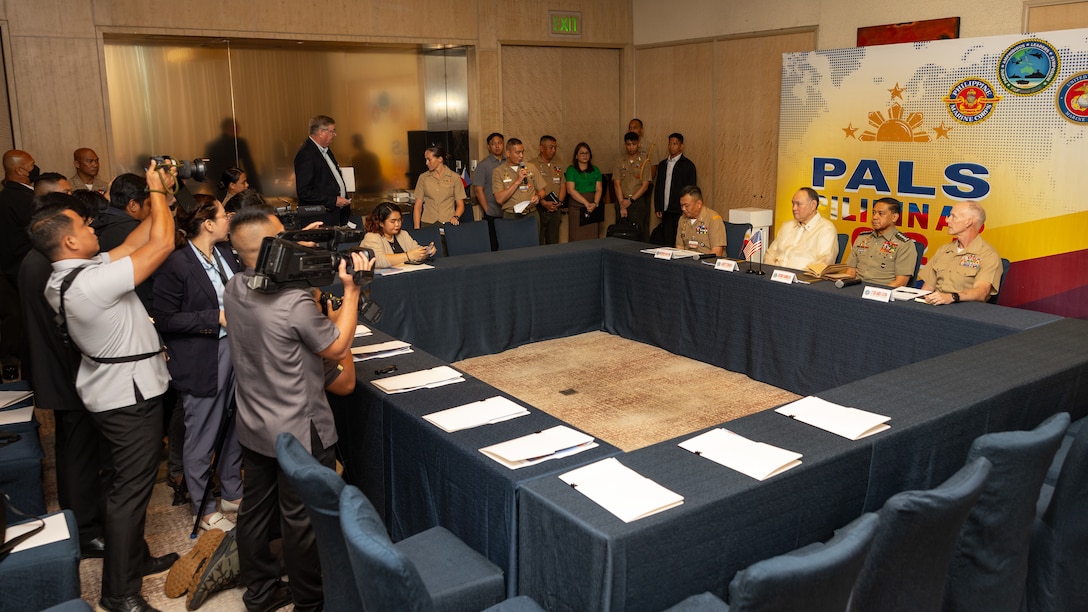 Local Filipino reporters and foreign media outlets in the Indo-Pacific region conduct a media roundtable with the 37th Commandant of the Philippine Marine Corps, Maj. Gen. Vicente Blanco, Philippines Secretary of National Defense Gilberto Teodoro Jr.,  Armed Forces of the Philippines Chief of Staff General Romeo Brawner Jr., and U.S. Marine Corps Lt. Gen. James Glynn, commander, U.S. Marine Corps Forces, Pacific, use convention below during the 11th iteration of the Pacific Amphibious Leaders Symposium, Manila, Philippines, July 8, 2025. Bringing together experts and leaders from across the Indo-Pacific, PALS fosters collaboration among Allied and partner amphibious and maritime forces to share knowledge and recent operational insights. This year’s symposium hosted senior leaders from 23 participating nations who are committed to a free and open Indo-Pacific, with the objective of strengthening and developing regional relationships. (U.S. Marine Corps photo by Lance Cpl. Blake Gonter)