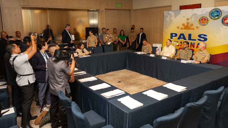 Local Filipino reporters and foreign media outlets in the Indo-Pacific region conduct a media roundtable with the 37th Commandant of the Philippine Marine Corps, Maj. Gen. Vicente Blanco, Philippines Secretary of National Defense Gilberto Teodoro Jr.,  Armed Forces of the Philippines Chief of Staff General Romeo Brawner Jr., and U.S. Marine Corps Lt. Gen. James Glynn, commander, U.S. Marine Corps Forces, Pacific, use convention below during the 11th iteration of the Pacific Amphibious Leaders Symposium, Manila, Philippines, July 8, 2025. Bringing together experts and leaders from across the Indo-Pacific, PALS fosters collaboration among Allied and partner amphibious and maritime forces to share knowledge and recent operational insights. This year’s symposium hosted senior leaders from 23 participating nations who are committed to a free and open Indo-Pacific, with the objective of strengthening and developing regional relationships. (U.S. Marine Corps photo by Lance Cpl. Blake Gonter)