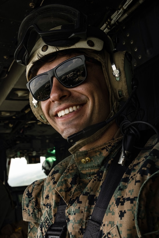 U.S. Marine Corps Capt. Kevin Uebelhardt, the deputy spokesman of Headquarters Marine Corps Communication Directorate with Special-Purpose Marine Air-Ground Task Force 250, participates in an Orientation and Indoctrination Flight as part of Marine Week Nashville in Nashville, Tennessee, June 3, 2025. The O&I flights allowed an opportunity for community leaders around Nashville to see and experience Marine Corps aviation, and interact with the Marines maintaining and flying these aircraft. Throughout 2025, Marines across the globe will celebrate the 250th birthday of the Corps, commemorating service, sacrifice, and priding themselves on living 'Semper Fidelis' or 'Always Faithful' to their nation and to each other. (U.S. Marine Corps photo by Lance Cpl. Judith Ann Lazaro)