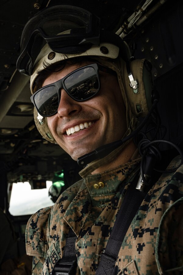 U.S. Marine Corps Capt. Kevin Uebelhardt, the deputy spokesman of Headquarters Marine Corps Communication Directorate with Special-Purpose Marine Air-Ground Task Force 250, participates in an Orientation and Indoctrination Flight as part of Marine Week Nashville in Nashville, Tennessee, June 3, 2025. The O&I flights allowed an opportunity for community leaders around Nashville to see and experience Marine Corps aviation, and interact with the Marines maintaining and flying these aircraft. Throughout 2025, Marines across the globe will celebrate the 250th birthday of the Corps, commemorating service, sacrifice, and priding themselves on living 'Semper Fidelis' or 'Always Faithful' to their nation and to each other. (U.S. Marine Corps photo by Lance Cpl. Judith Ann Lazaro)
