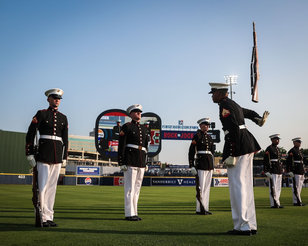 U.S. Marines with the United States Marine Corps Silent Drill Platoon, Marine Barracks Washington, perform during a celebrity softball game at First Horizon Park in Nashville, Tenn., June 2, 2025. Founded on November 10, 1775, the United States Marine Corps has served our nation honorably in every clime and place for 250 years. Throughout 2025, Marines across the globe will celebrate the 250th birthday of the Corps, commemorating service, sacrifice, and priding themselves on living "Semper Fidelis" or "Always Faithful" to their nation and to each other. (U.S. Marine Corps photo by Lance Cpl. Brynn L. Bouchard)