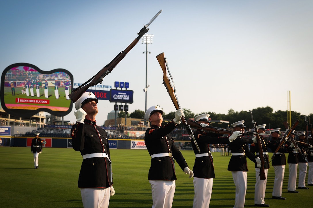U.S. Marines with the United States Marine Corps Silent Drill Platoon, Marine Barracks Washington, perform during a celebrity softball game at First Horizon Park in Nashville, Tenn., June 2, 2025. Founded on November 10, 1775, the United States Marine Corps has served our nation honorably in every clime and place for 250 years. Throughout 2025, Marines across the globe will celebrate the 250th birthday of the Corps, commemorating service, sacrifice, and priding themselves on living "Semper Fidelis" or "Always Faithful" to their nation and to each other. (U.S. Marine Corps photo by Lance Cpl. Brynn L. Bouchard)