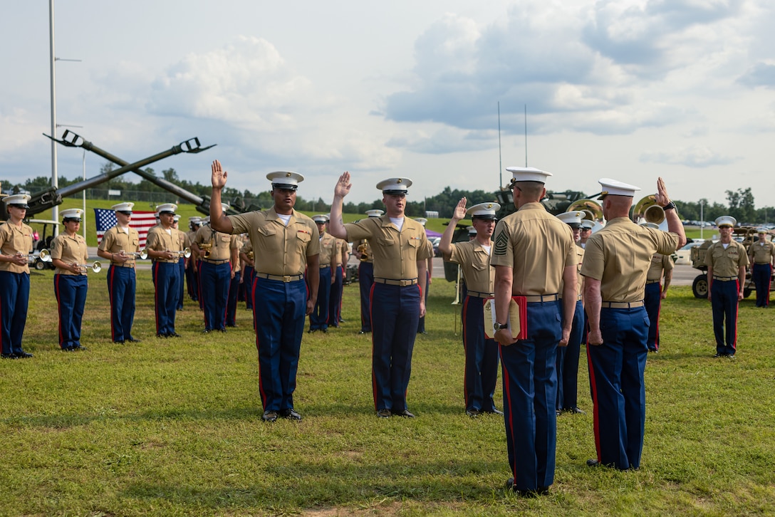 U.S. Marines with 2d Marine Aircraft Wing Band recites the Oath of Enlistment for a reenlistment ceremony during the Cracker Barrel 400 brand activation as part of Marine Week Nashville 2025 at the Nashville Superspeedway, Nashville, Tennessee, June 1, 2025. Founded on November 10, 1775, the United States Marine Corps has served our nation honorably in every clime and place for 250 years. Throughout 2025, Marines across the globe will celebrate the 250th birthday of the Corps, commemorating service, sacrifice, and priding themselves on living 'Semper Fidelis' or 'Always Faithful' to their nation and to each other. (U.S. Marine Corps photo by Lance Cpl. Judith Ann Lazaro)