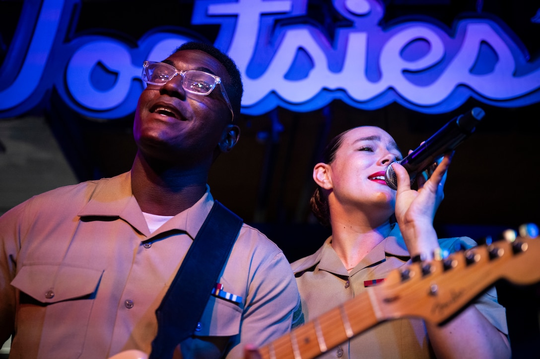 U.S. Marine Corps Sgt. Elizabeth Morino and Cpl. Jobari Noel, Marine musicians with 2nd Marine Aircraft Wing band, Special Purpose Marine Air Ground Task Force-250, perform at Tootsies Orchid Lounge during Marine Week Nashville, in Nashville, Tennessee, June 6, 2025. Tootsies hosted the 2nd MAW band as a way to show support for the Marine Corps. Throughout 2025, Marines across the globe will celebrate the 250th birthday of the Corps, commemorating, service, sacrifice, and priding themselves on living ‘Semper Fidelis’ or ‘Always Faithful’ to their nation and to each other. (U.S. Marine Corps photo by Cpl. Vincent Needham)