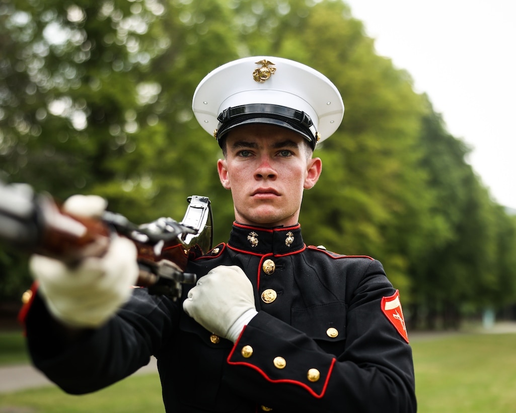 U.S. Marine Corps Lance Cpl. Trey Earls, a rifleman with the United States Marine Corps Silent Drill Platoon, Marine Barracks Washington, performs during a wreath-laying ceremony at the World War II commemoration held at Bicentennial Capitol Mall State Park in Nashville, Tenn., June 4, 2025. As part of Marine Week Nashville 2025, Silent Drill Platoon performed a ceremonial routine to honor the legacy of World War II veterans and mark the 250th anniversary of the Marine Corps. Their presence reflects the Corps’ dedication to tradition, excellence, and community engagement. (U.S. Marine Corps photo by Lance Cpl. Brynn L. Bouchard)