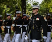 U.S. Marine Corps Capt. Ford Higgins, platoon commander, United States Marine Corps Silent Drill Platoon, Marine Barracks Washington, marches the platoon during a wreath-laying ceremony at the World War II commemoration held at Bicentennial Capitol Mall State Park in Nashville, Tenn., June 4, 2025. The ceremony was part of Marine Week Nashville 2025, honoring the service and sacrifice of World War II veterans. Marines from Marine Barracks Washington participated in the event to preserve tradition, showcase ceremonial excellence, and celebrate 250 years of Marine Corps history. (U.S. Marine Corps photo by Lance Cpl. Brynn L. Bouchard)
