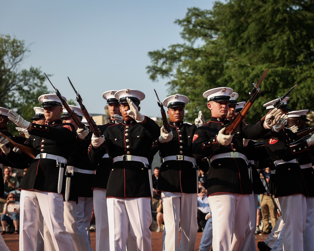 U.S. Marines with the United States Marine Corps Silent Drill Platoon, Marine Barracks Washington, perform during the 250th Marine Corps Birthday Ceremony at City Hall in Murfreesboro, near Nashville, Tenn., June 4, 2025. Renowned for their precise, wordless execution of drill movements, the 24-Marine unit captivated attendees with a display of discipline, synchronization, and ceremonial excellence. Their performance was part of Marine Week Nashville 2025, honoring the Marine Corps’ 250th anniversary and its enduring connection with the American people. (U.S. Marine Corps photo by Lance Cpl. Brynn L. Bouchard)
