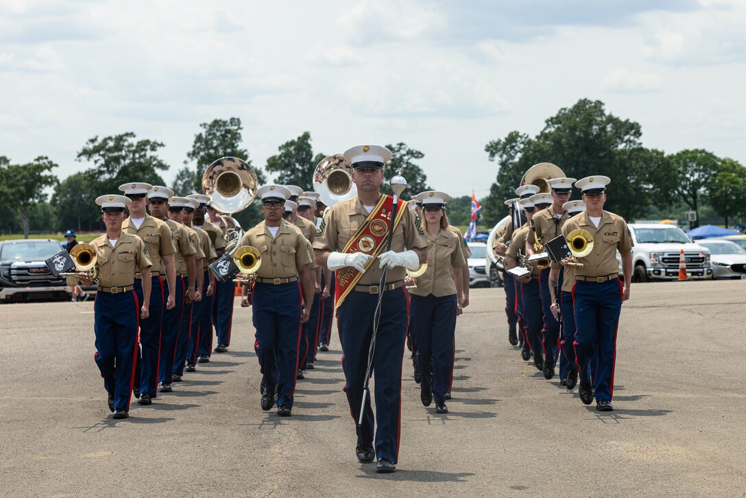 U.S. Marines with 2d Marine Aircraft Wing Band march during the Cracker Barrel 400 brand activation as part of Marine Week Nashville 2025 at the Nashville Superspeedway, Nashville, Tennessee, June 1, 2025. Founded on November 10, 1775, the United States Marine Corps has served our nation honorably in every clime and place for 250 years. Throughout 2025, Marines across the globe will celebrate the 250th birthday of the Corps, commemorating service, sacrifice, and priding themselves on living 'Semper Fidelis' or 'Always Faithful' to their nation and to each other. (U.S. Marine Corps photo by Lance Cpl. Judith Ann Lazaro)