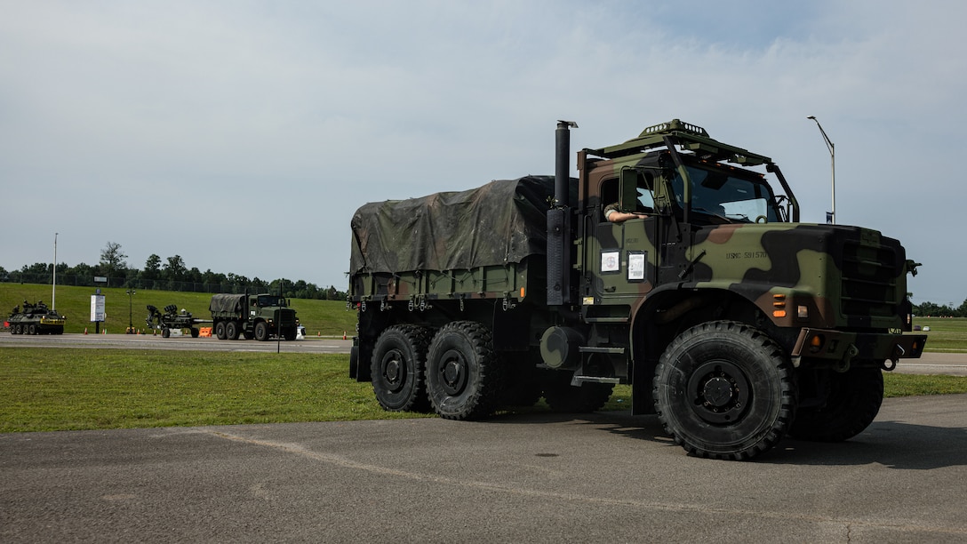 A U.S. Marine Corps Medium Tactical Vehicle Replacement stages outside for the Cracker Barrel 400 brand activation during Marine Week Nashville 2025 at the Nashville Superspeedway, Nashville, Tennessee, June 1, 2025. Founded on November 10, 1775, the United States Marine Corps has served our nation honorably in every clime and place for 250 years. Throughout 2025, Marines across the globe will celebrate the 250th birthday of the Corps, commemorating service, sacrifice, and priding themselves on living 'Semper Fidelis' or 'Always Faithful' to their nation and to each other. (U.S. Marine Corps photo by Lance Cpl. Judith Ann Lazaro)