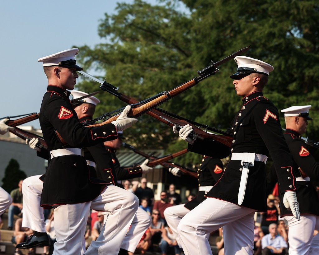 U.S. Marines with the United States Marine Corps Silent Drill Platoon, Marine Barracks Washington, perform during the 250th Marine Corps Birthday Ceremony at City Hall in Murfreesboro, near Nashville, Tenn., June 4, 2025. Renowned for their precise, wordless execution of drill movements, the 24-Marine unit captivated attendees with a display of discipline, synchronization, and ceremonial excellence. Their performance was part of Marine Week Nashville 2025, honoring the Marine Corps’ 250th anniversary and its enduring connection with the American people. (U.S. Marine Corps photo by Lance Cpl. Brynn L. Bouchard)